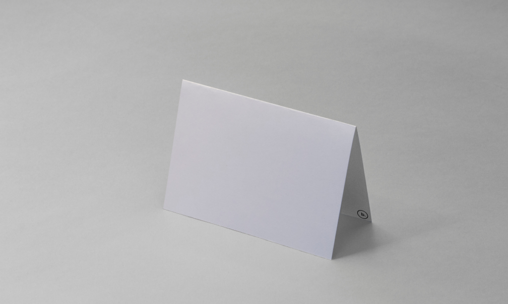 A Sheet of Notebook Paper Folded in Half